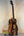 Electric-acoustic Luna Vista Baritone Ukulele with intricate wooden design and bridge