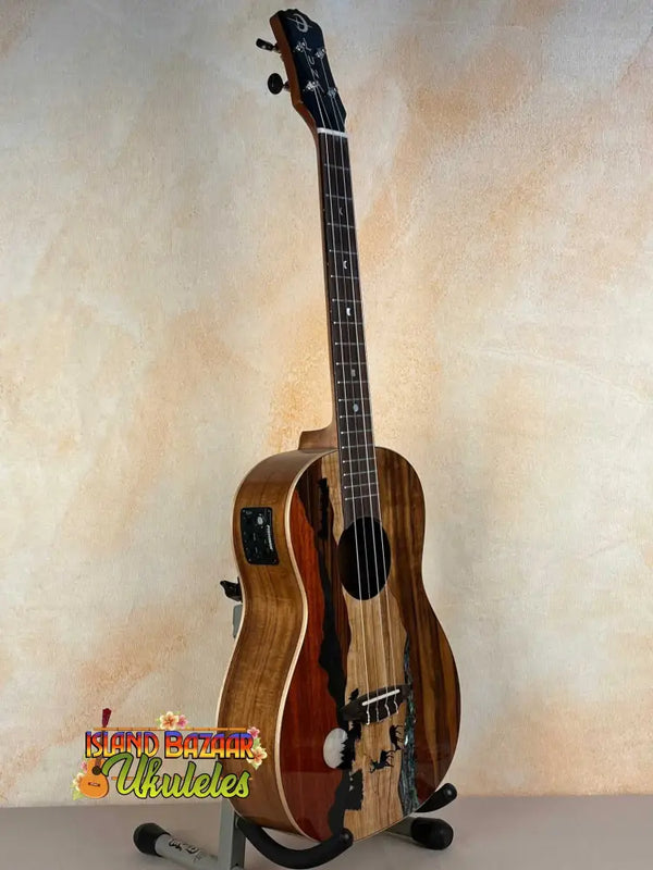 Electric-acoustic Luna Vista Baritone Ukulele with intricate wooden design and bridge