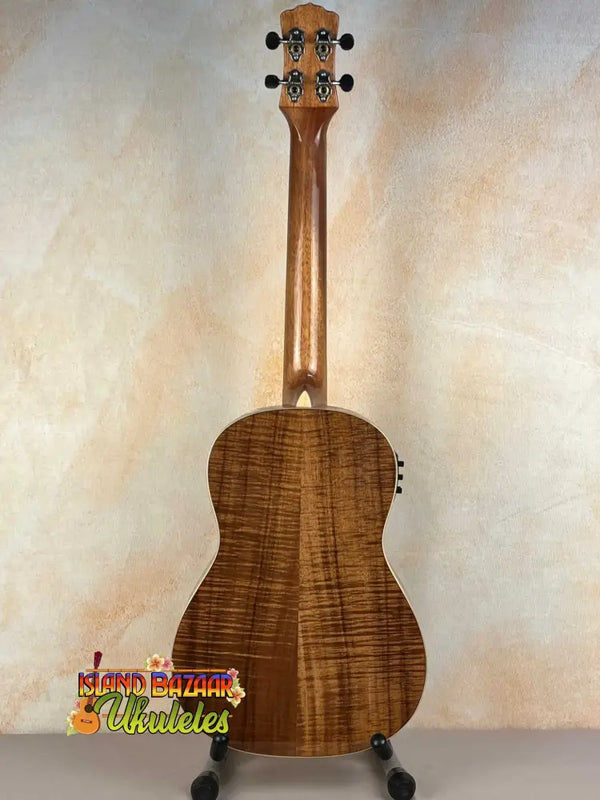 Wooden ukulele in figured Koa wood grain from Luna Vista Baritone Acoustic-Electric Deer Series