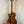 Beautiful Luna Vista Tenor Ukulele with rich brown wood grain pattern in bag