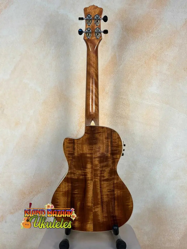 Beautiful Luna Vista Tenor Ukulele with rich brown wood grain pattern in bag