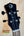 Guitar headstock featuring Luna logo and tuning pegs on Vista Tenor Ukulele