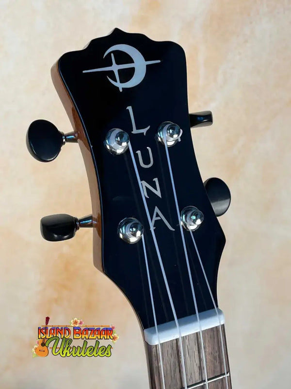 Guitar headstock featuring Luna logo and tuning pegs on Vista Tenor Ukulele