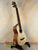 Wooden ukulele on stand showcasing Mya-Moe Long Neck Tenor Ukulele with Spruce Top