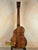 Wooden back of Mya-Moe Long Neck Tenor Ukulele showing Koa finish and craftsmanship