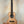 Natural wood Nebula Tenor Ukulele showcasing Western Red Cedar and Claro Walnut craftsmanship