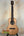 Natural wood Nebula Tenor Ukulele showcasing Western Red Cedar and Claro Walnut craftsmanship