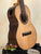 Wooden Nebula Tenor Ukulele in Western Red Cedar and Claro Walnut on a stand