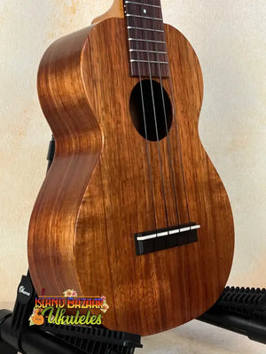 Wooden Kamaka Concert Ukulele HF-2 in rich brown finish with black bridge