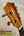 Wooden ukulele headstock on New Kamaka HF-3 Tenor Ukulele with solid koa finish