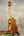 Wooden Kamaka HF-3 Tenor Ukulele on stand showcasing its solid Koa craftsmanship