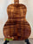 Acoustic guitar featuring Premium Curly Koa back in Kanile’a Honus Tenor Ukulele