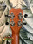 Guitar headstock with chrome tuning pegs, featured in Kanile’a K-1 Soprano Ukulele