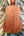 Wooden acoustic guitar back panel showcasing natural wood grain of Kanile’a K-1 Soprano