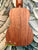Wooden acoustic guitar back panel showcasing natural wood grain of Kanile’a K-1 Soprano