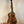 Wooden ukulele with a dark fretboard and black tuning pegs, KoAloha Royal Pikake KTM-10RP