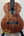 Wooden Kamaka HF-3I Slothead Tenor Ukulele with dark grain and black fretboard