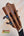 Guitar headstock of Kamaka HF-3I Slothead Tenor Ukulele with figured maple wood and blue pegs