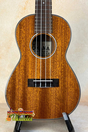 Ohana CK-35G Solid Mahogany Concert Ukulele showcasing beautiful wood grain patterns