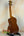 Wooden Ohana CK-35G Solid Mahogany Concert Ukulele on black stand for sale