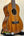 Beautiful Ohana CK-35G Solid Mahogany Concert Ukulele with four strings and dark finish