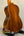 Classical acoustic guitar featuring rich mahogany finish alongside Ohana CK-370G Concert Ukulele
