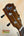 Ohana CK-50WG Concert Ukulele headstock with silver tuning pegs and dark wood finish