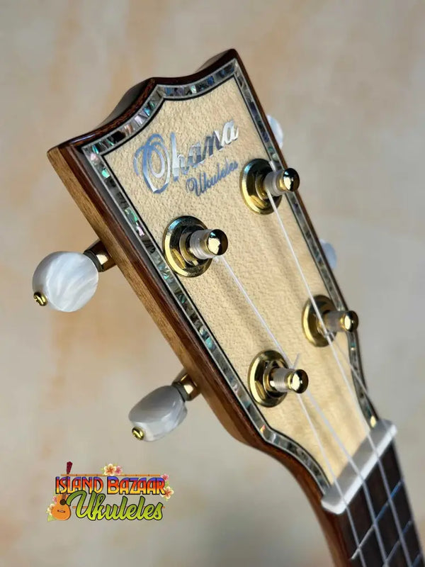 Ohana CK-75CG Concert Ukulele headstock with tuning pegs and decorative inlay