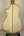 Back view of Ohana CK-75CG Concert Ukulele showcasing flamed maple wood and decorative binding