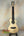 Natural wood Ohana CK-75CG Concert Ukulele with decorative binding and cutaway design