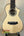 Natural wood Ohana CK-75CG Concert Ukulele with abalone inlay and spruce top detail