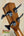 Wooden guitar headstock with black tuning pegs on Ohana OBU-22 U-Bass Rhythm Line Ukulele