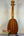 Wooden Ukulele with natural finish and black tuning pegs, Ohana PKC-50G Solid Cedar model