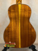 Ohana TK-350G Tenor Ukulele showcasing rich honey-colored wood back panel design