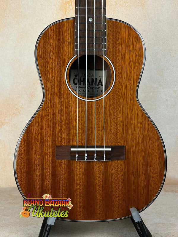 Wooden Ohana TK-35G Solid Mahogany Tenor Ukulele with dark brown grain and black fretboard