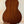 Wooden back panel of Ohana TK-35G Solid Mahogany Tenor Ukulele on display stand