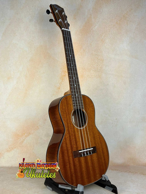 Ohana TK-35G Solid Mahogany Tenor Ukulele with four strings and a rich mahogany finish