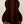 Dark rosewood back panel of Ohana TK-50G Solid Cedar Tenor Ukulele on wooden stand