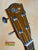 Ohana TK-50G headstock featuring chrome tuning pegs on a solid cedar tenor ukulele