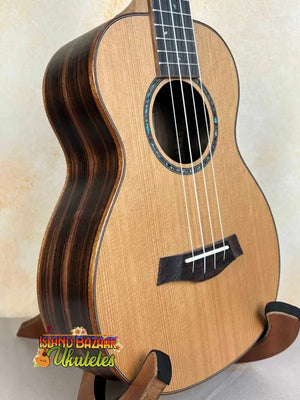 Ohana TK-50ME Solid Cedar Top Tenor Ukulele with dark striped sides and decorative rosette