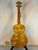 Golden quilted maple Ohana TK-50WG Tenor Ukulele with glossy finish and solid cedar body