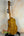 Wooden ukulele showcasing curly maple grain, Ohana TK-50WG Tenor with solid cedar & willow