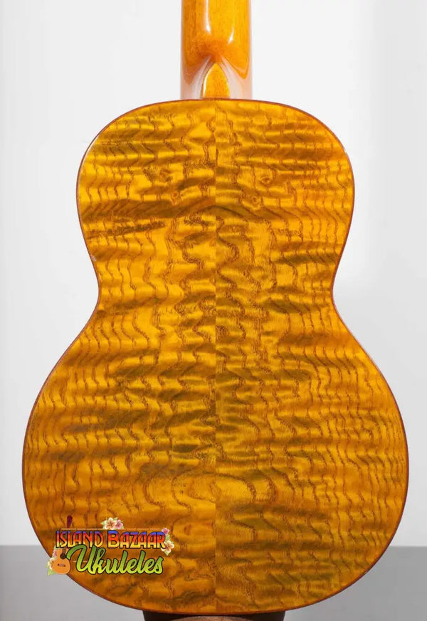 Golden acoustic guitar featuring quilted maple, Ohana TK-70WG Spruce Top Tenor Ukulele