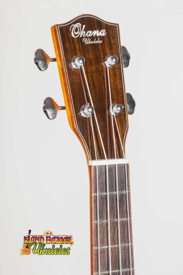 Ohana TK-70WG Spruce Top Tenor Ukulele headstock with silver tuning pegs and dark wood