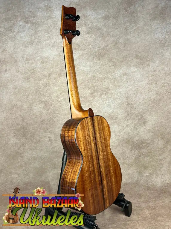 Glossy reddish-brown PCH Sunshine Tenor Ukulele with solid Hawaiian Koa wood and ebony fretboard