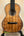 Ornate wooden tenor ukulele crafted by Phil Henderson from solid Hawaiian koa wood