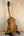 Wooden tenor ukulele on stand from PCH Sunshine Phil Henderson with solid Hawaiian Koa