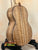 Wooden ukulele with curly grain from Phil Henderson’s The Ladder series in solid myrtle