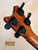 Guitar headstock with black tuning pegs on wooden neck of Pepe Romero TTM-23032