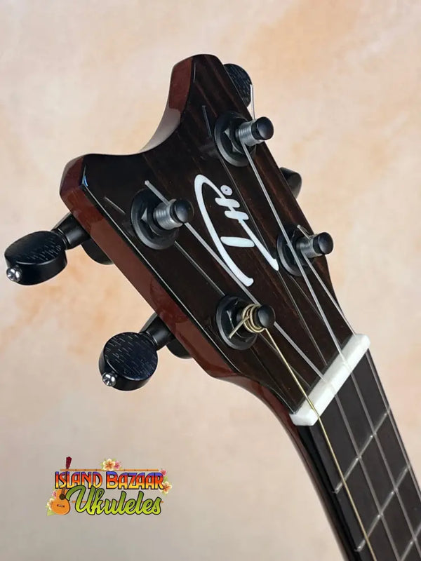 Black ukulele headstock with pegs and logo for Pepe Romero TTM-23032 Tiny Tenor